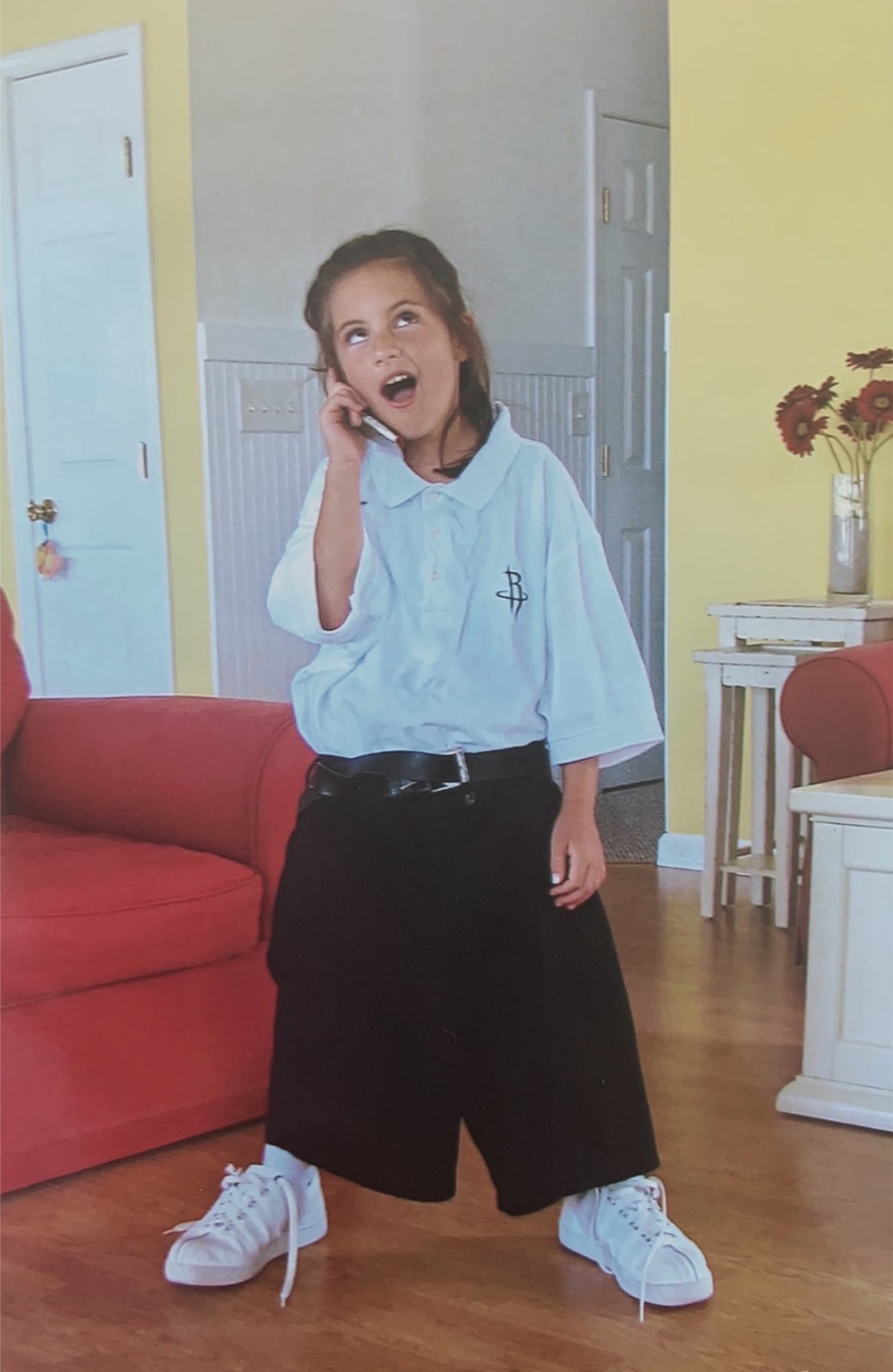 Megan as a kid dressed up as her coach dad